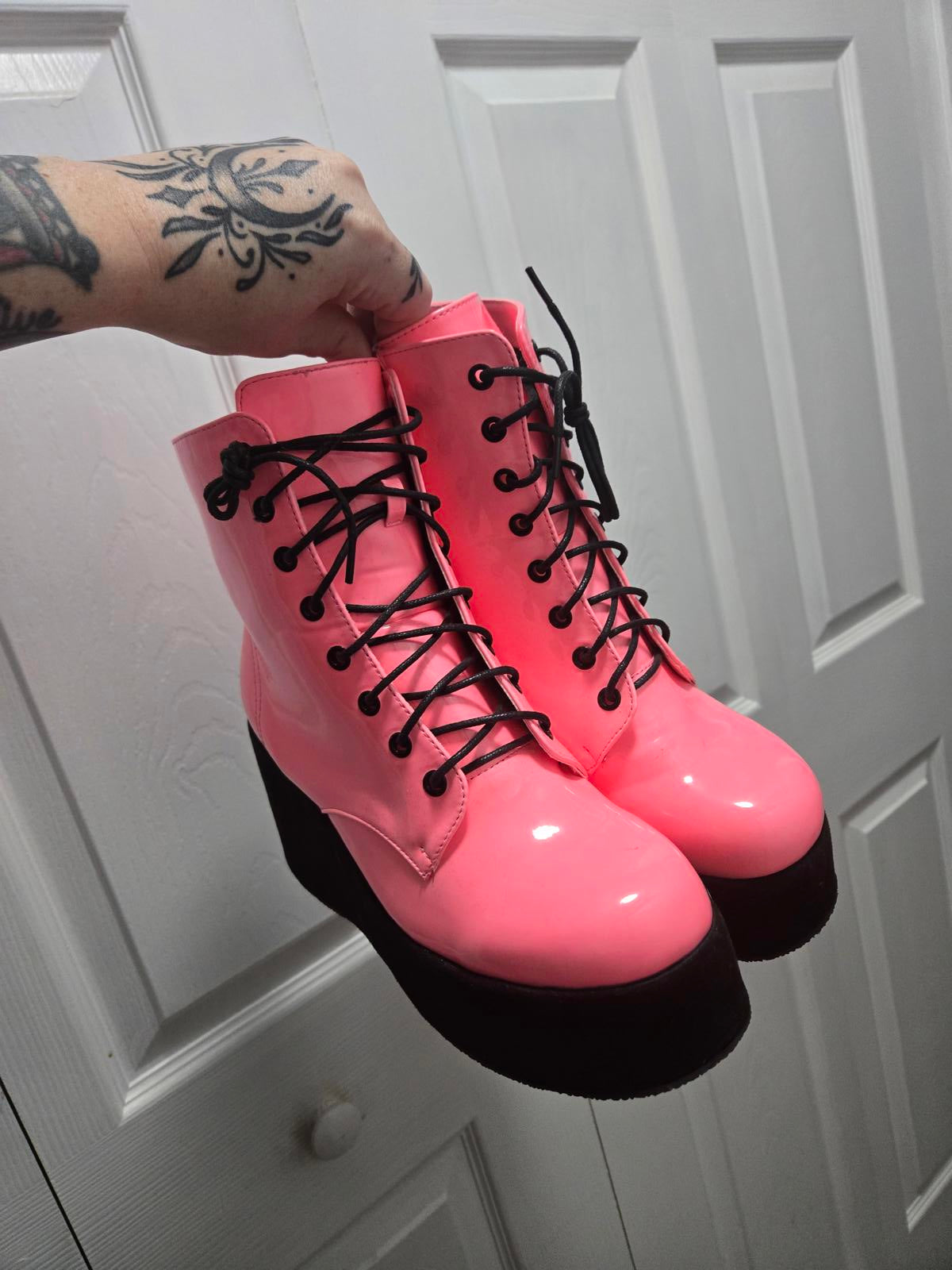 Neon pink lace up platform boots