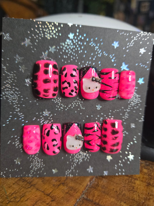 Hello Kitty hot pink animal print nails