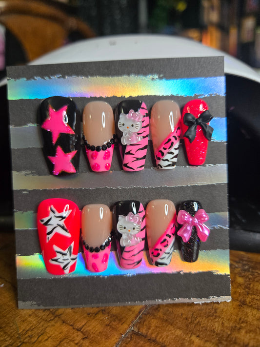Hello Kitty mixed animal print nails