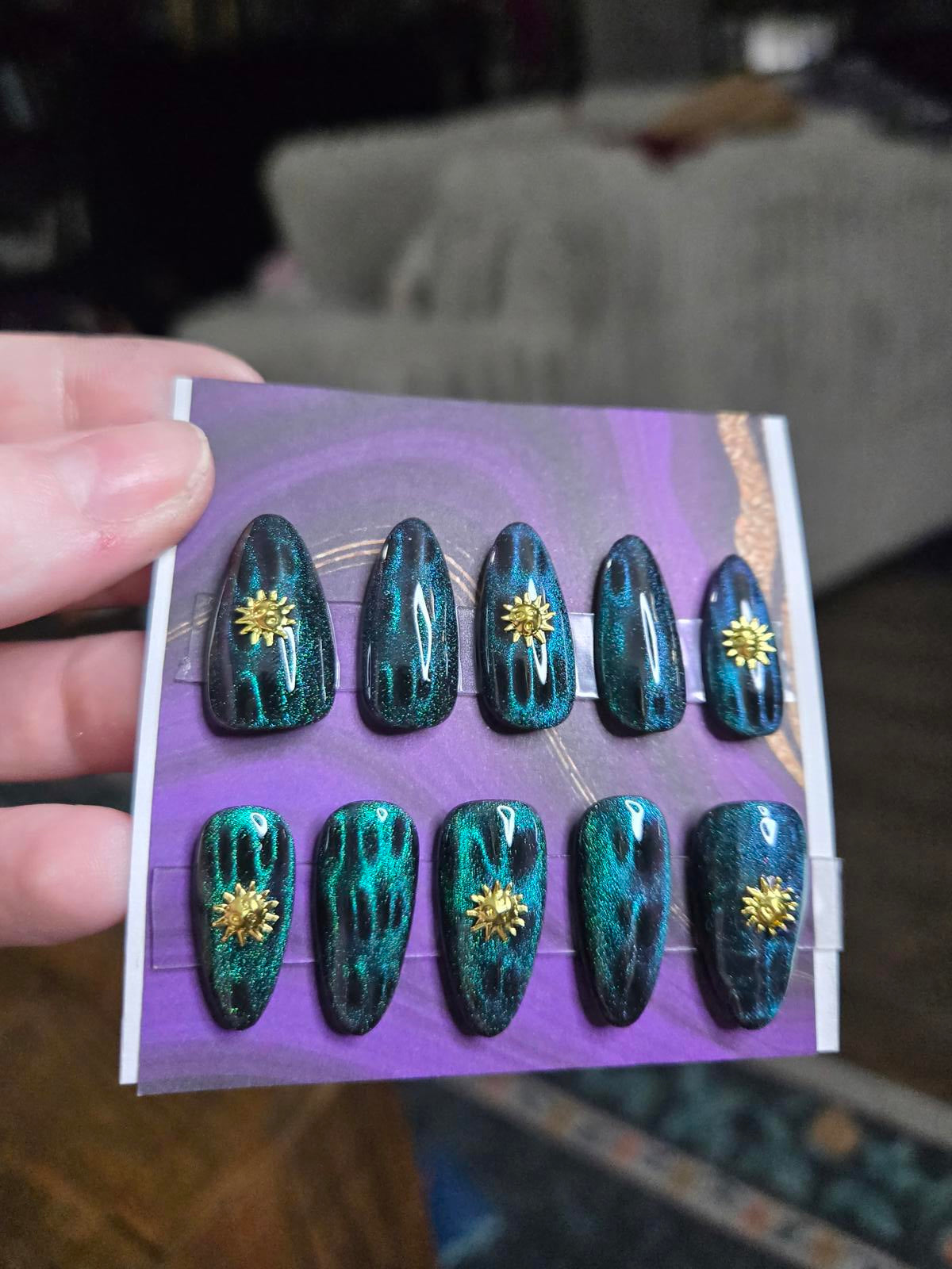 Almond green cat eye and sun nails custom made