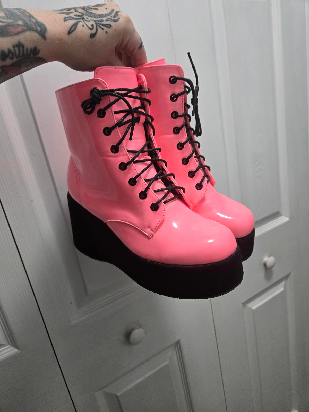 Neon pink lace up platform boots