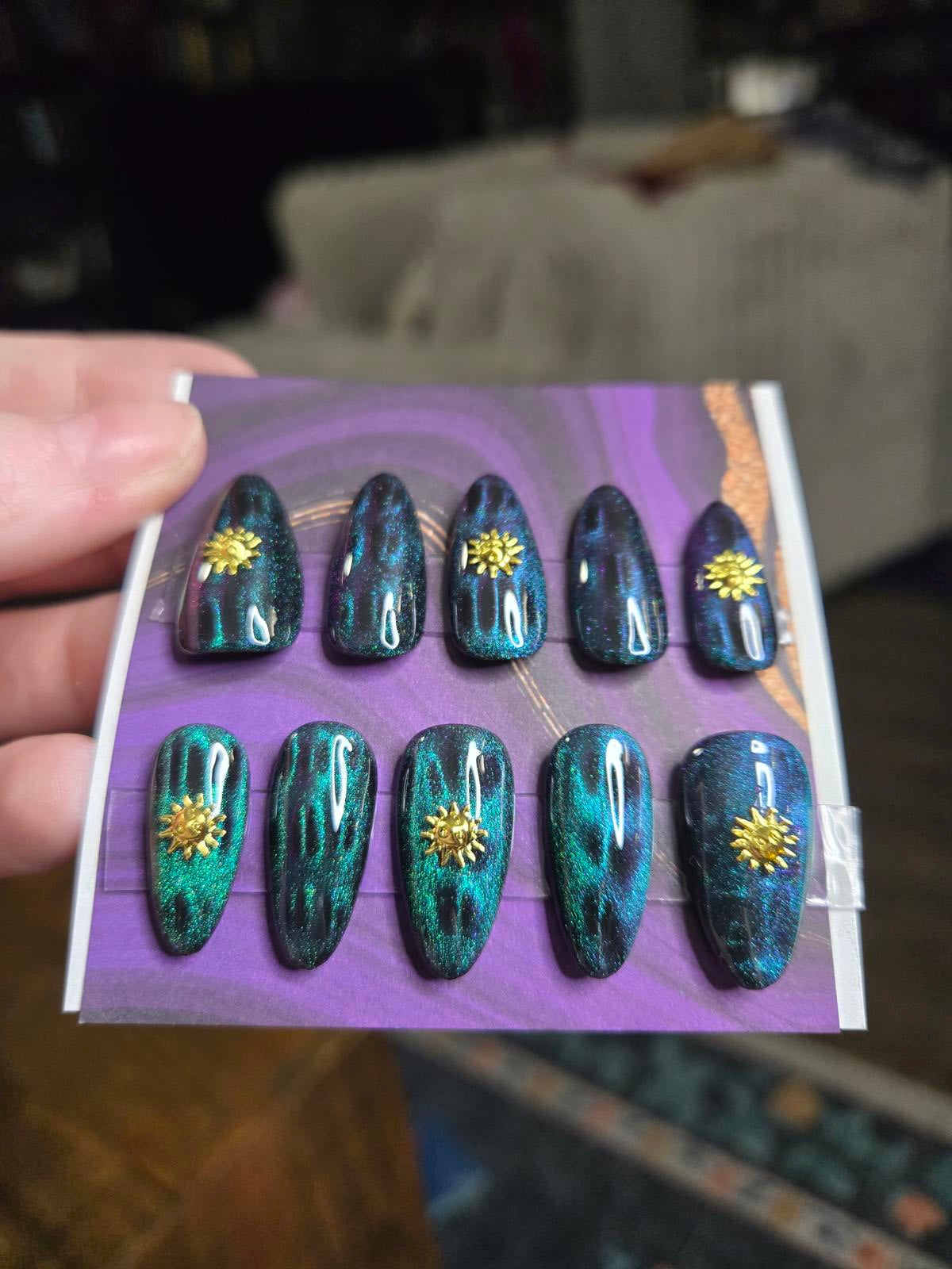 Almond green cat eye and sun nails custom made