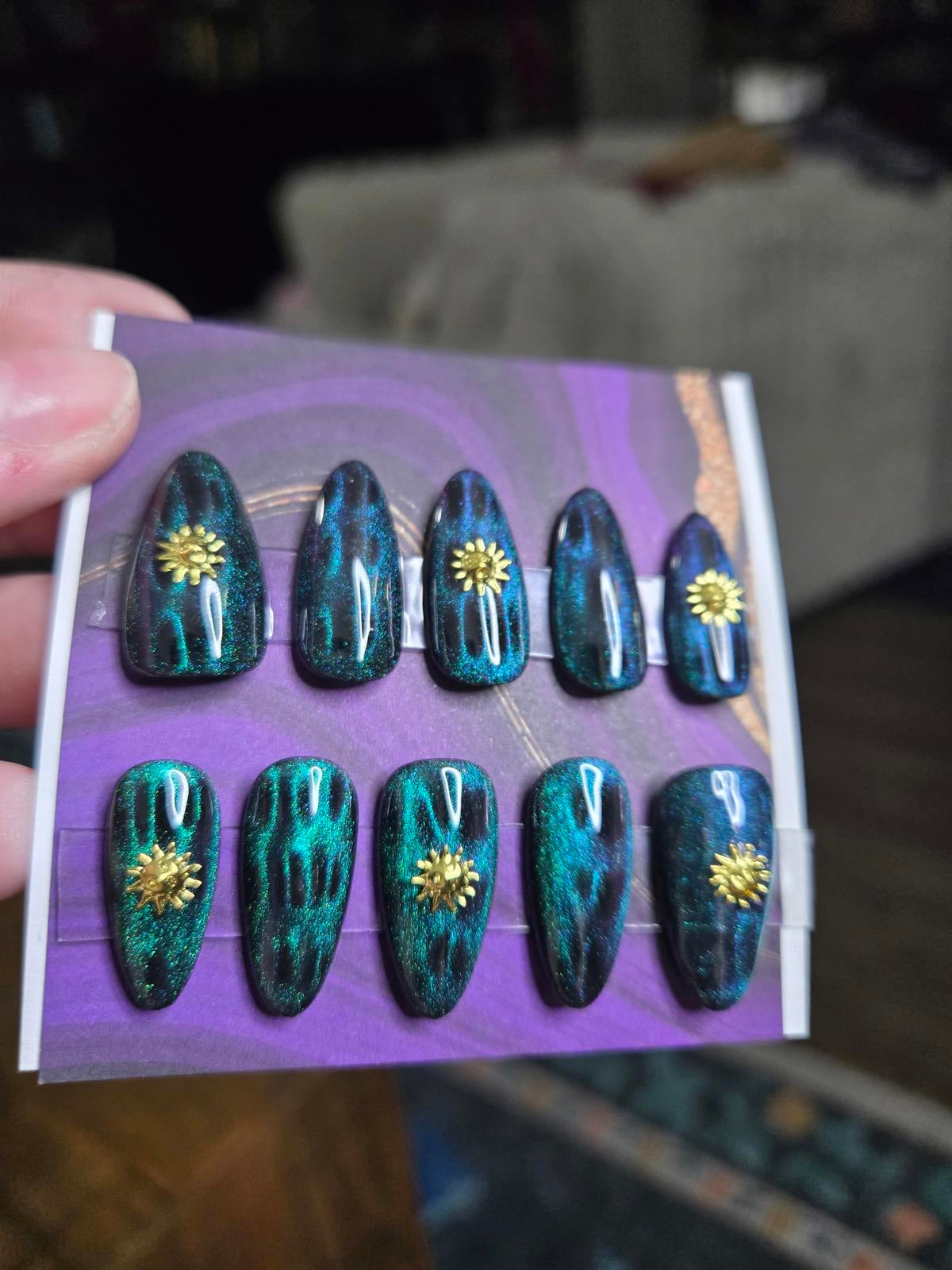 Almond green cat eye and sun nails custom made
