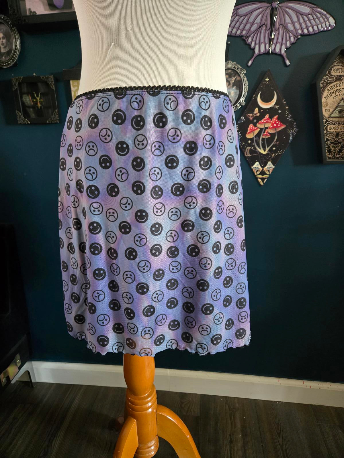 Horoscopez smiley frown face mesh mini skirt