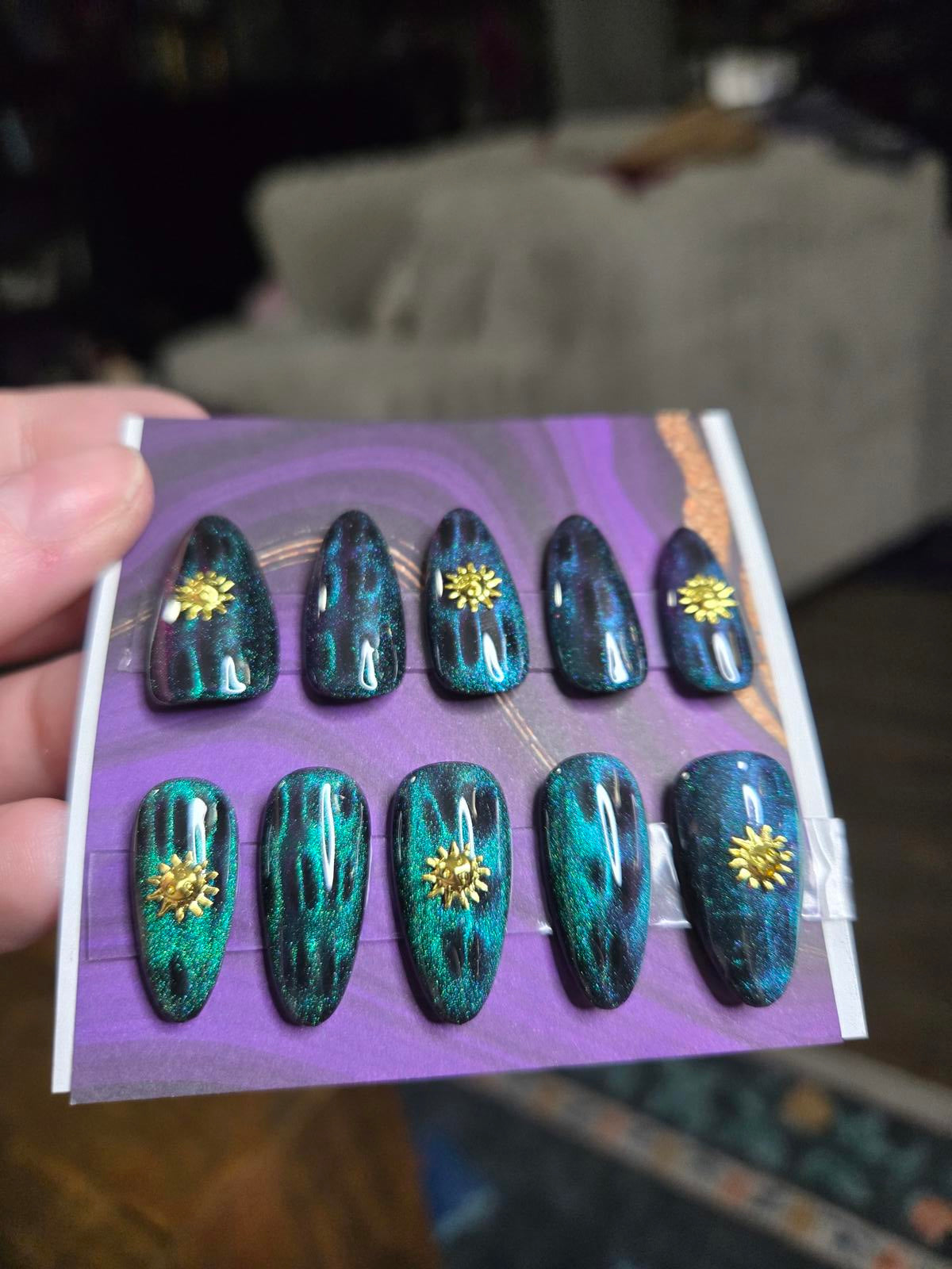 Almond green cat eye and sun nails custom made