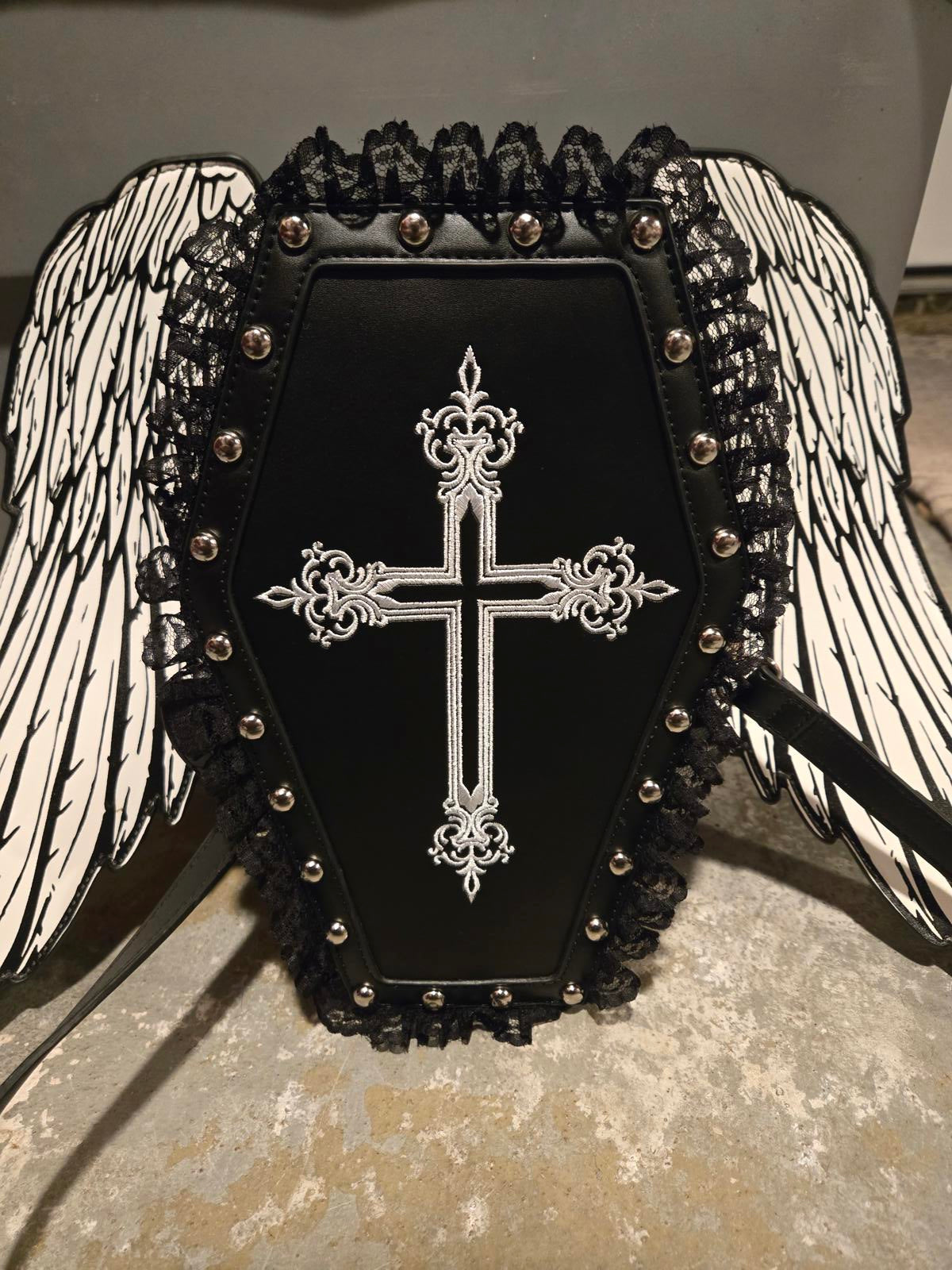 Dolls kill coffin shaped lace and studded handbag with detachable wings