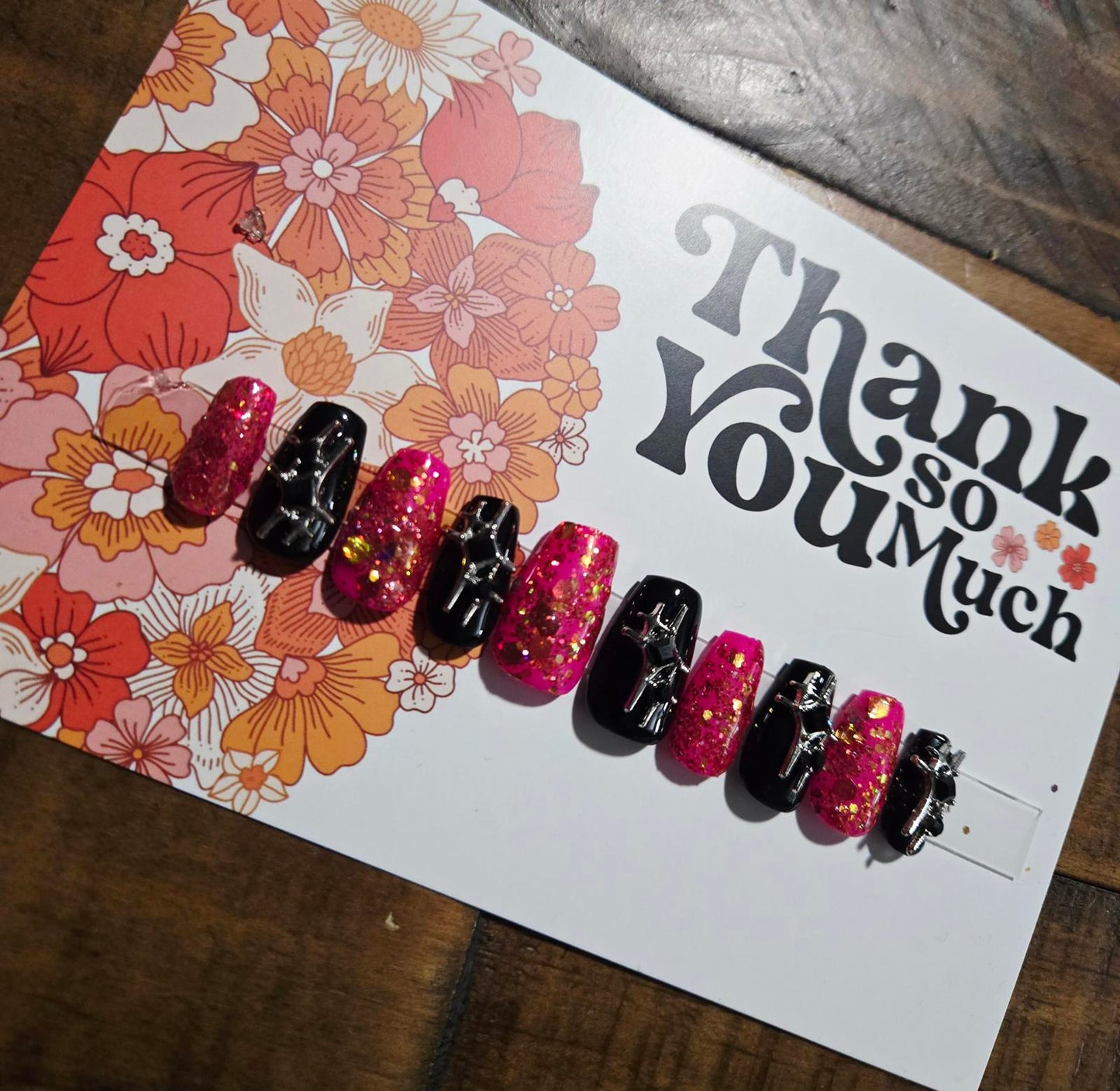 Short coffin chunky pink glitter and black press on nails with charms