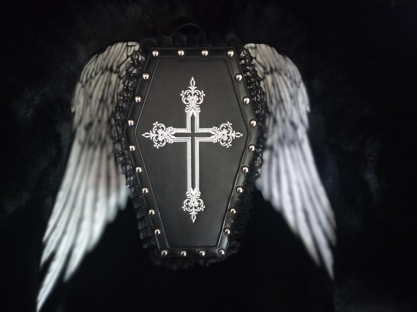 Dolls kill coffin shaped lace and studded handbag with detachable wings