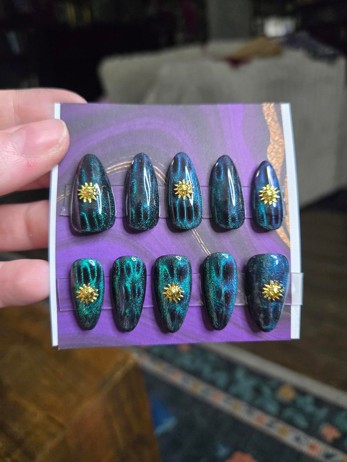Almond green cat eye and sun nails custom made