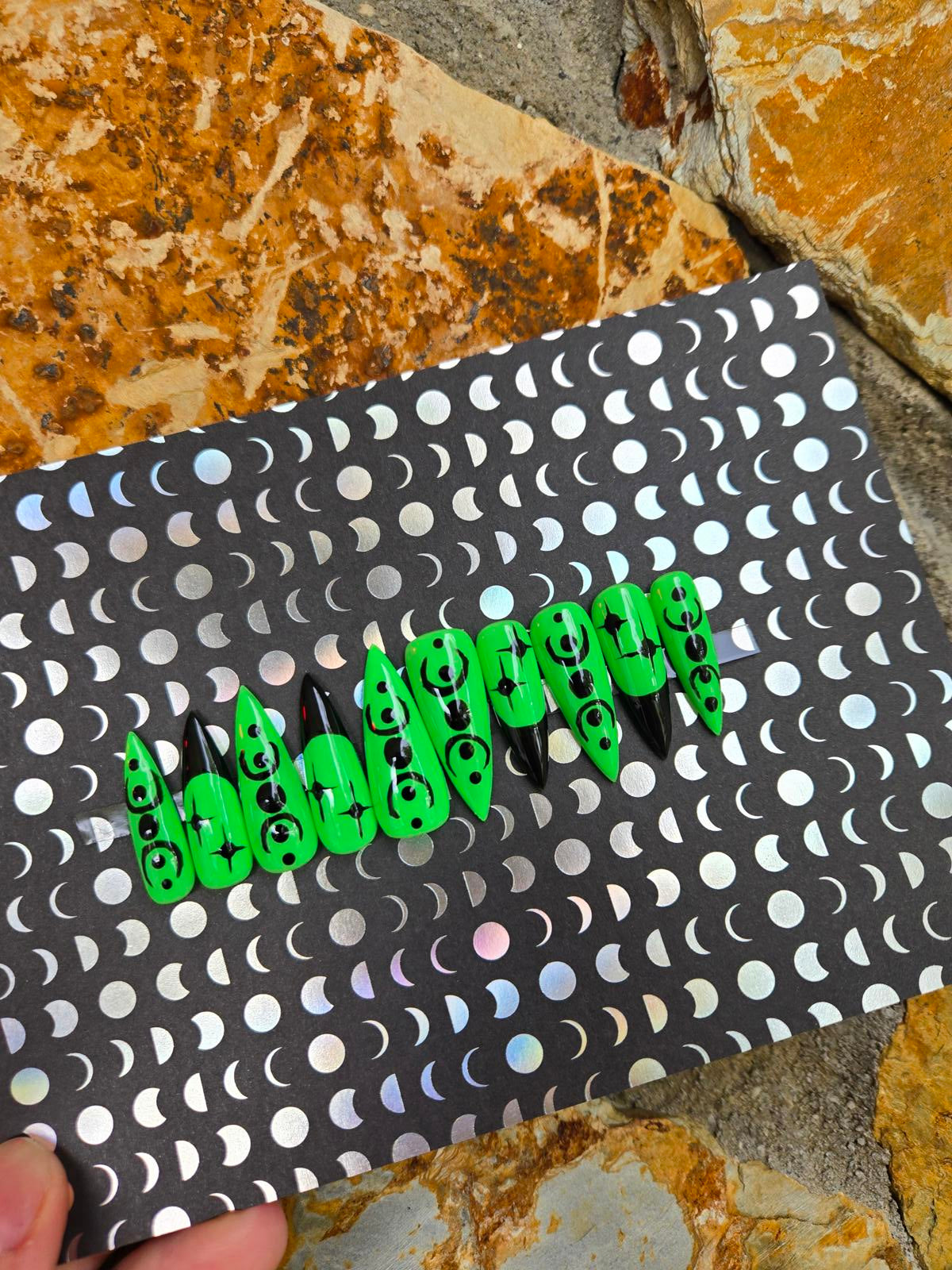Green and black witchy stiletto nails custom made