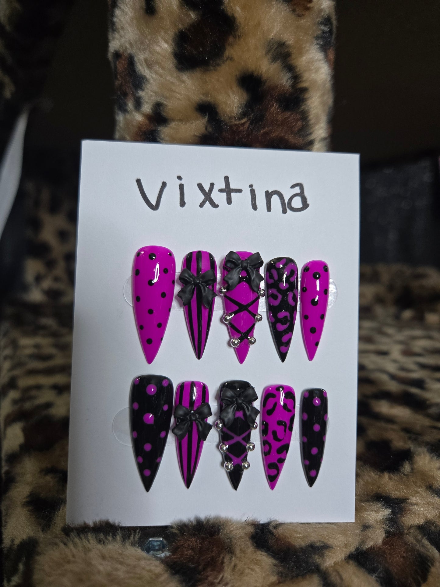 Baddie corset and bow animal print nails