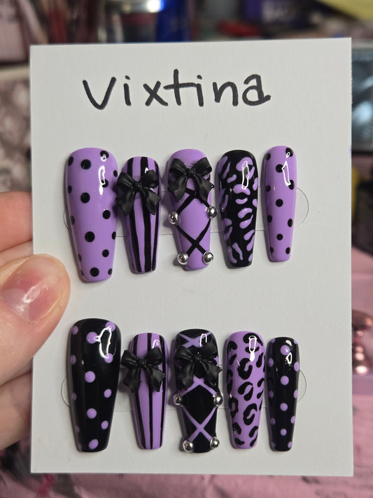 Baddie corset and bow animal print nails