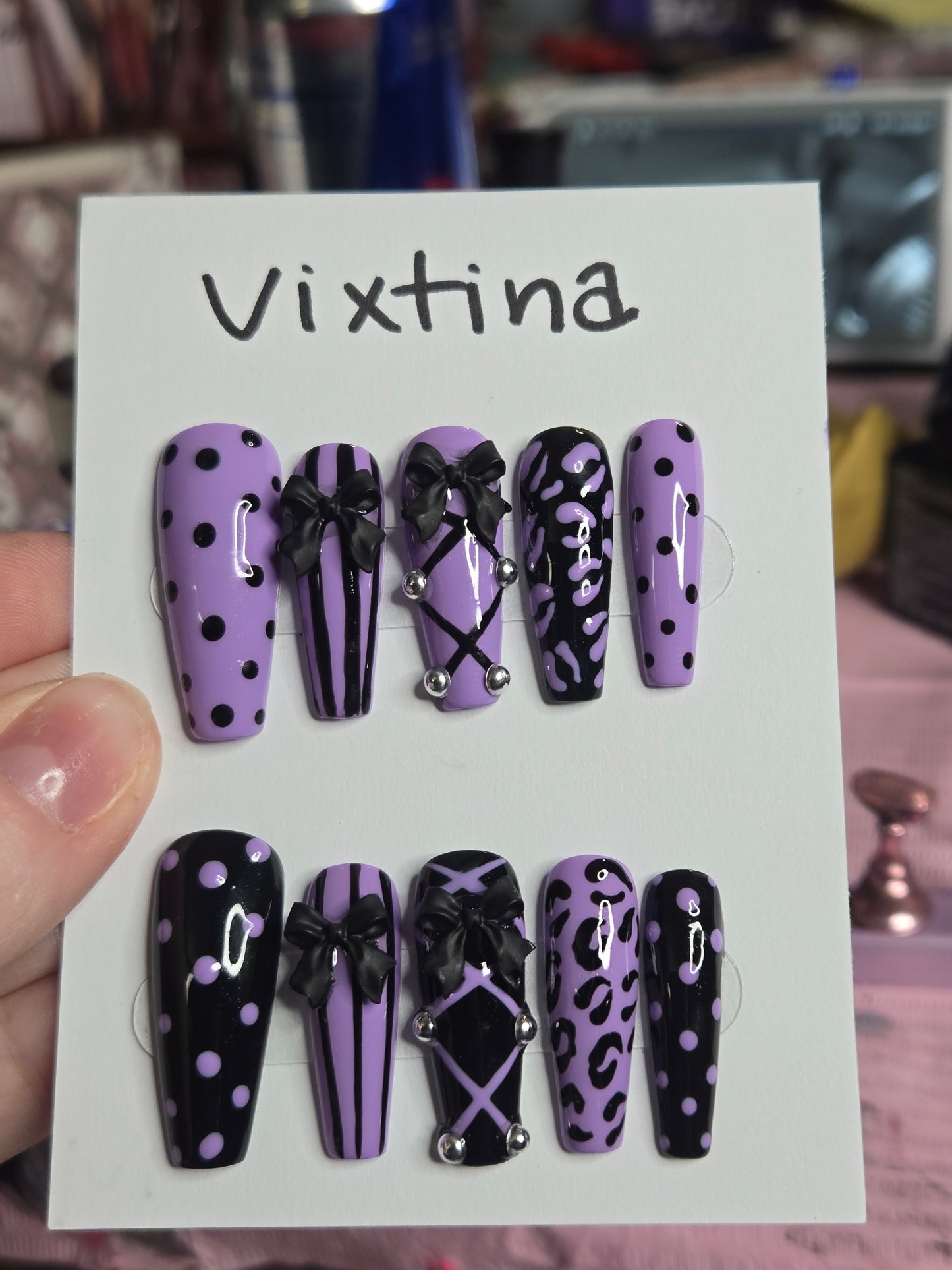 Baddie corset and bow animal print nails