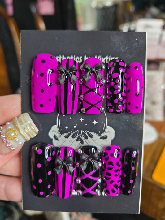 Baddie corset and bow animal print nails