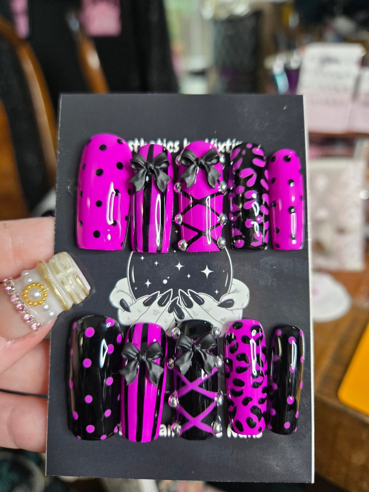 Baddie corset and bow animal print nails