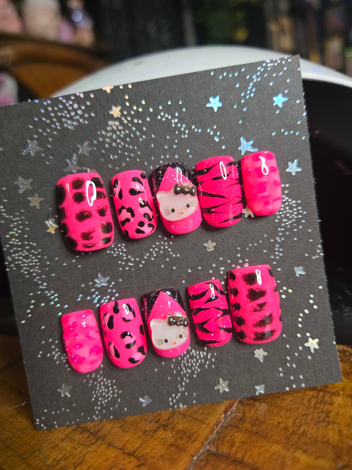 Hello Kitty hot pink animal print nails
