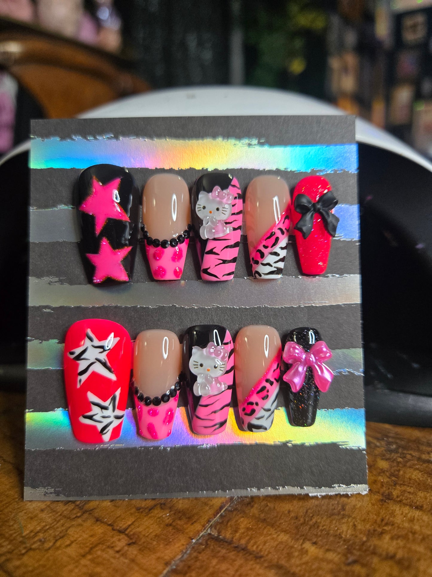 Hello Kitty mixed animal print nails