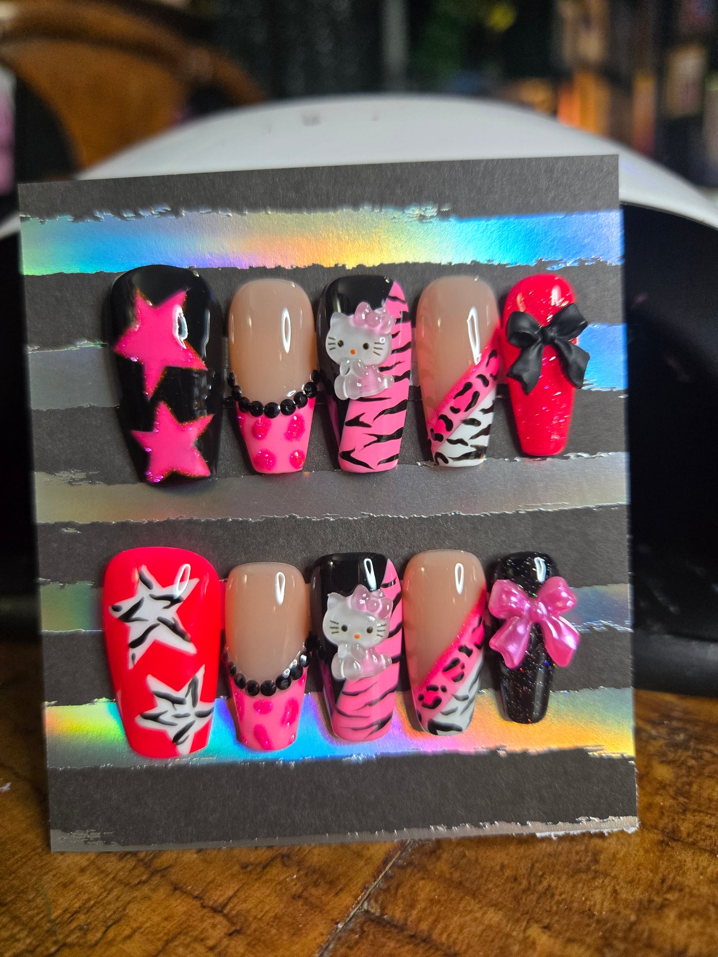 Hello Kitty mixed animal print nails