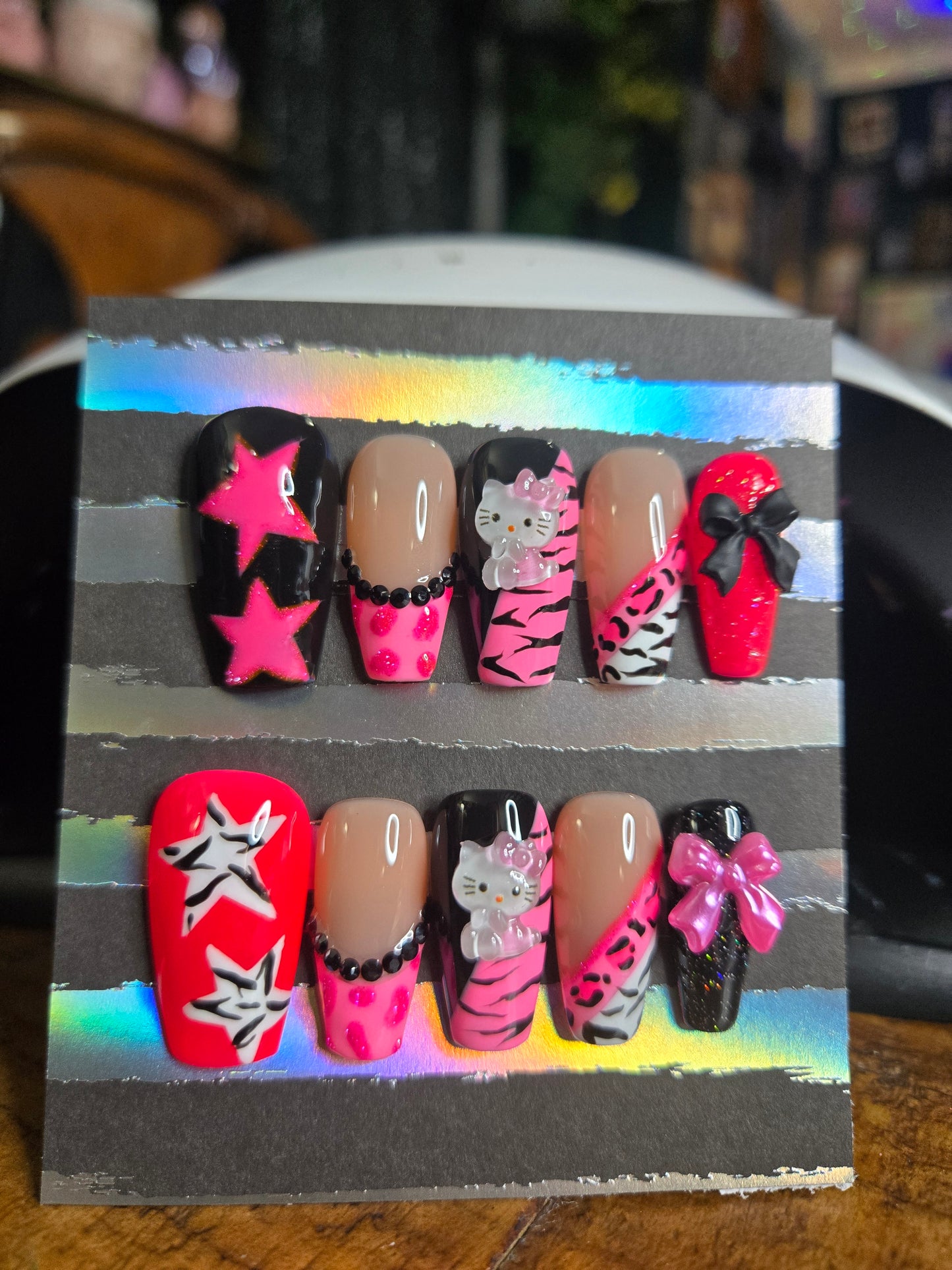Hello Kitty mixed animal print nails
