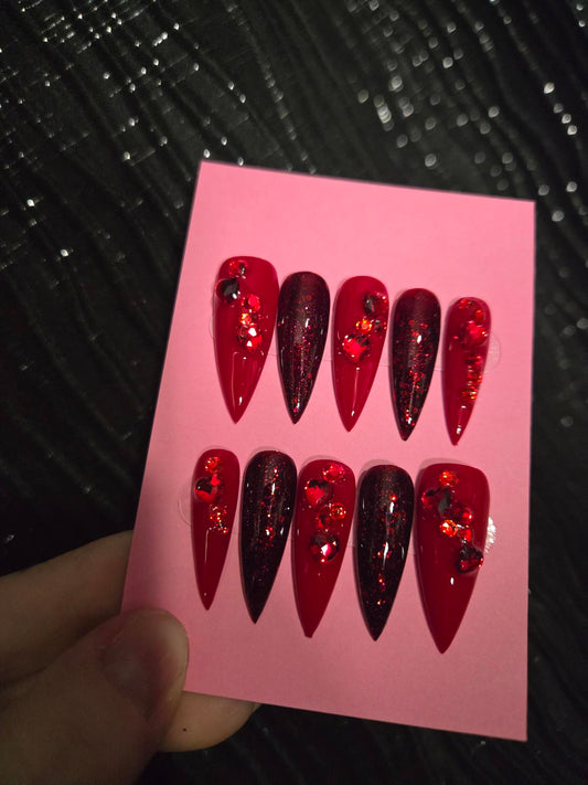 Long red stiletto nails custom made roses and bling