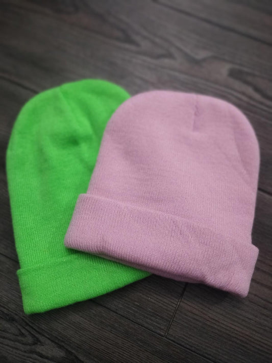 Pink and neon green beanie hats