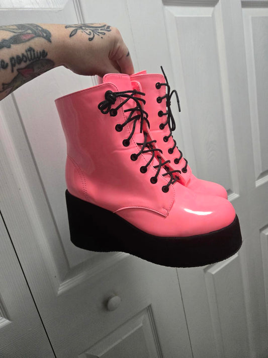Neon pink lace up platform boots