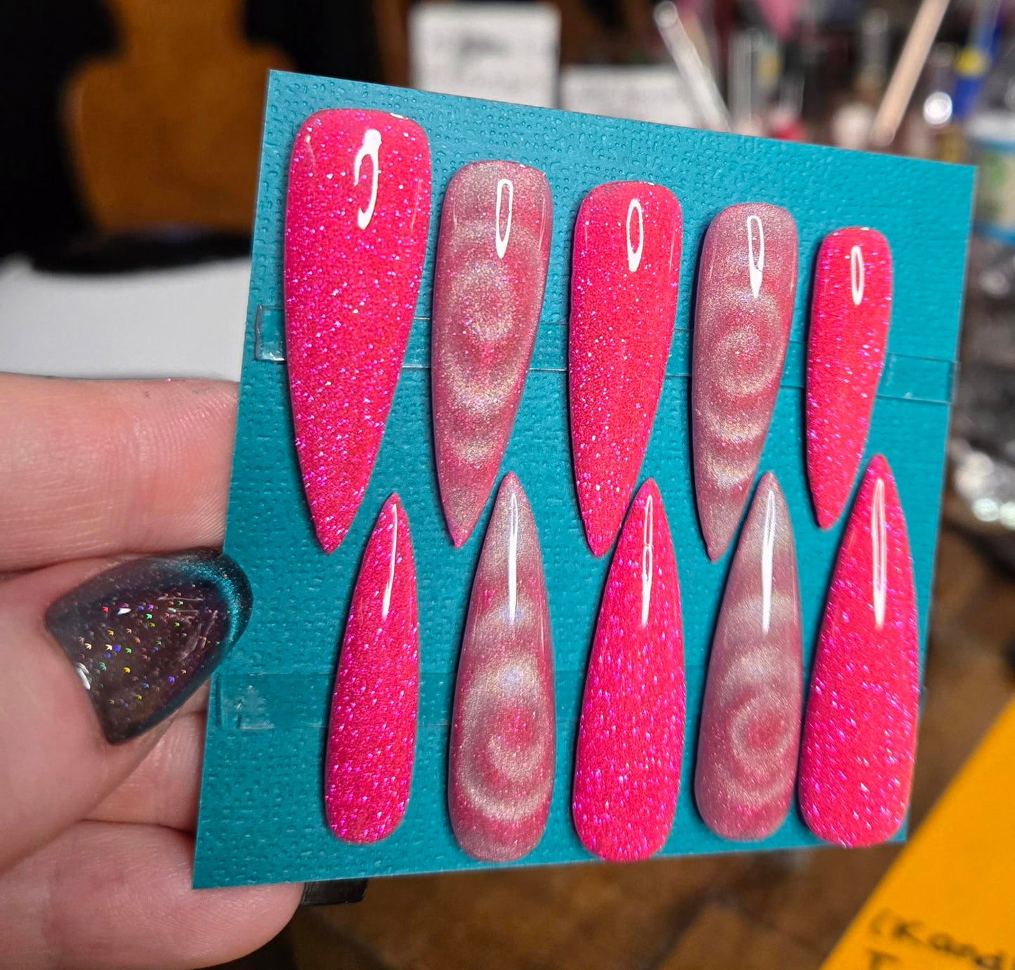 Super long pink glitter and swirl stiletto nails custom made