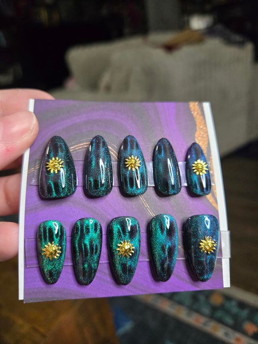 Almond green cat eye and sun nails custom made