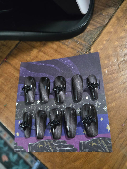 Black and silver cat eye nails with bats custom made