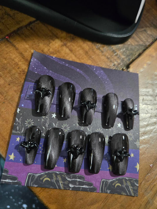 Black and silver cat eye nails with bats custom made