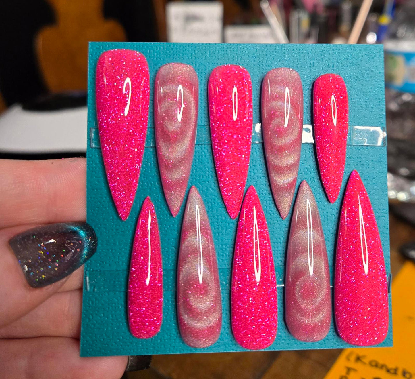 Super long pink glitter and swirl stiletto nails custom made