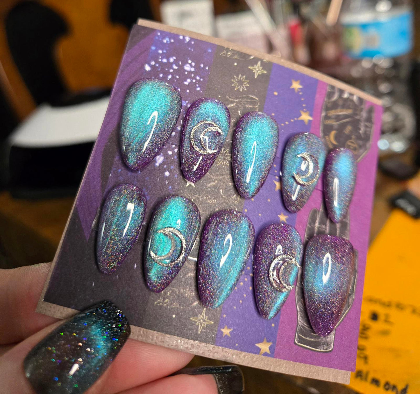 Witchy blue purple cat eye almond nails custom made