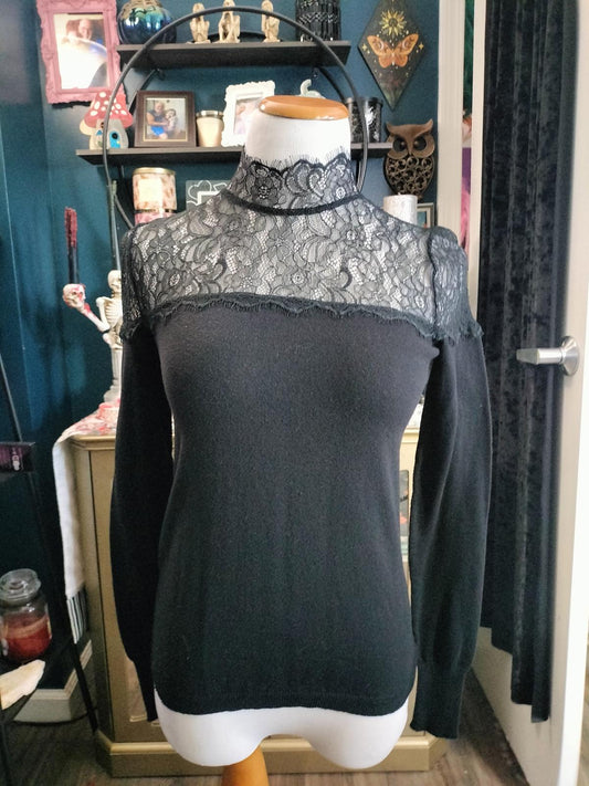 Jenifer Lopez black long sleeve lace blouse