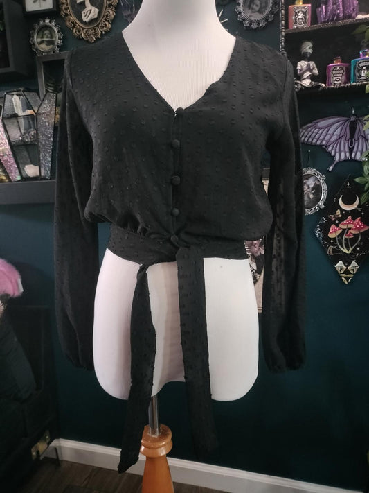 Black long sleeve blouse with buttons up front and tie