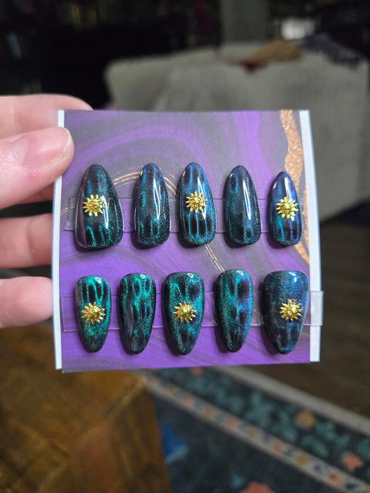Almond green cat eye and sun nails custom made