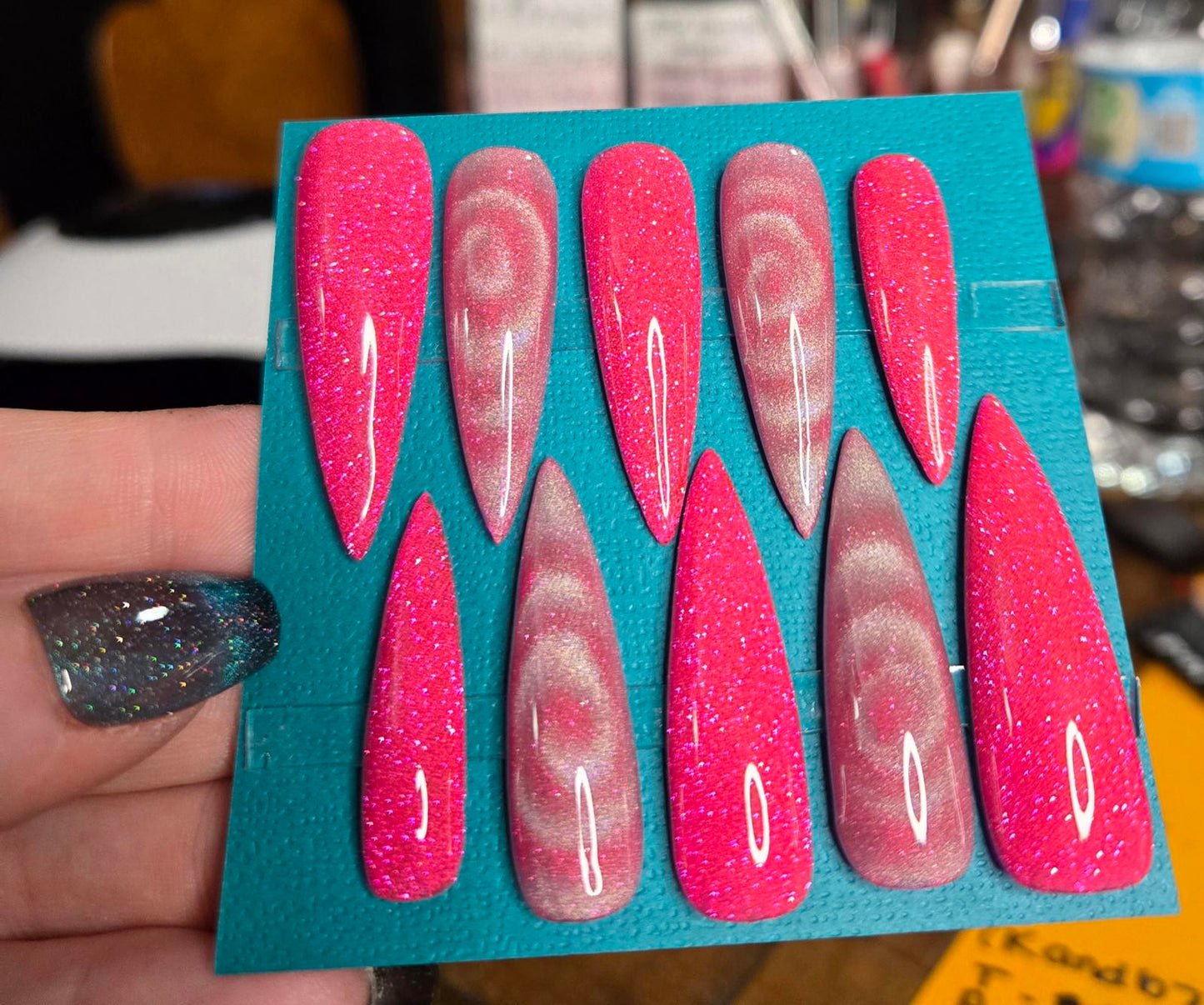 Super long pink glitter and swirl stiletto nails custom made