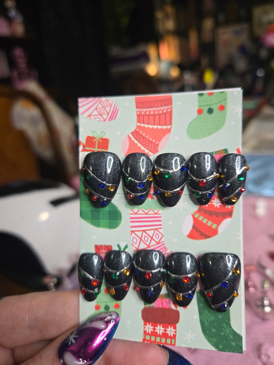 Black glittery christmas lights almond nails custom made