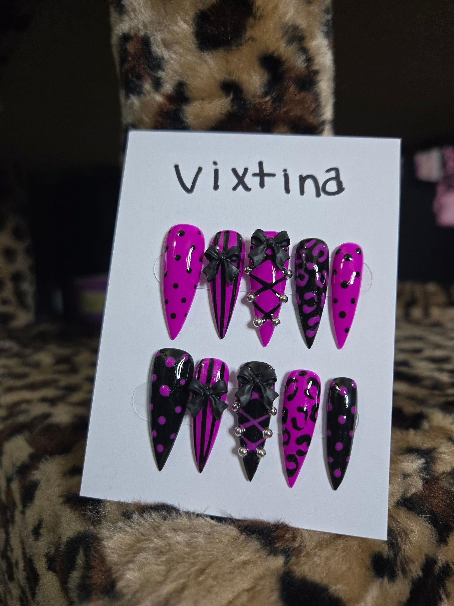 Baddie corset and bow animal print nails