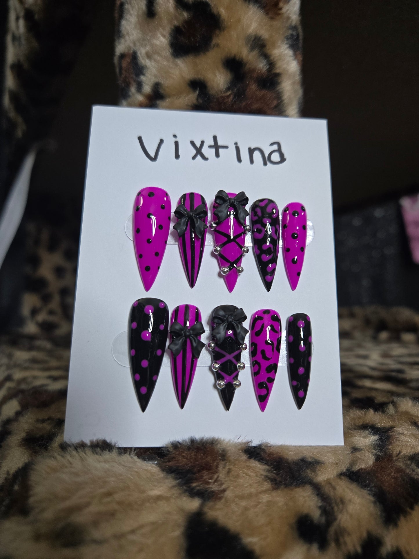 Baddie corset and bow animal print nails