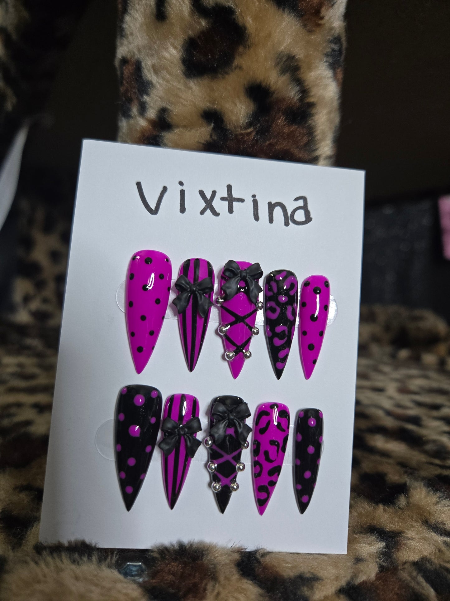 Baddie corset and bow animal print nails
