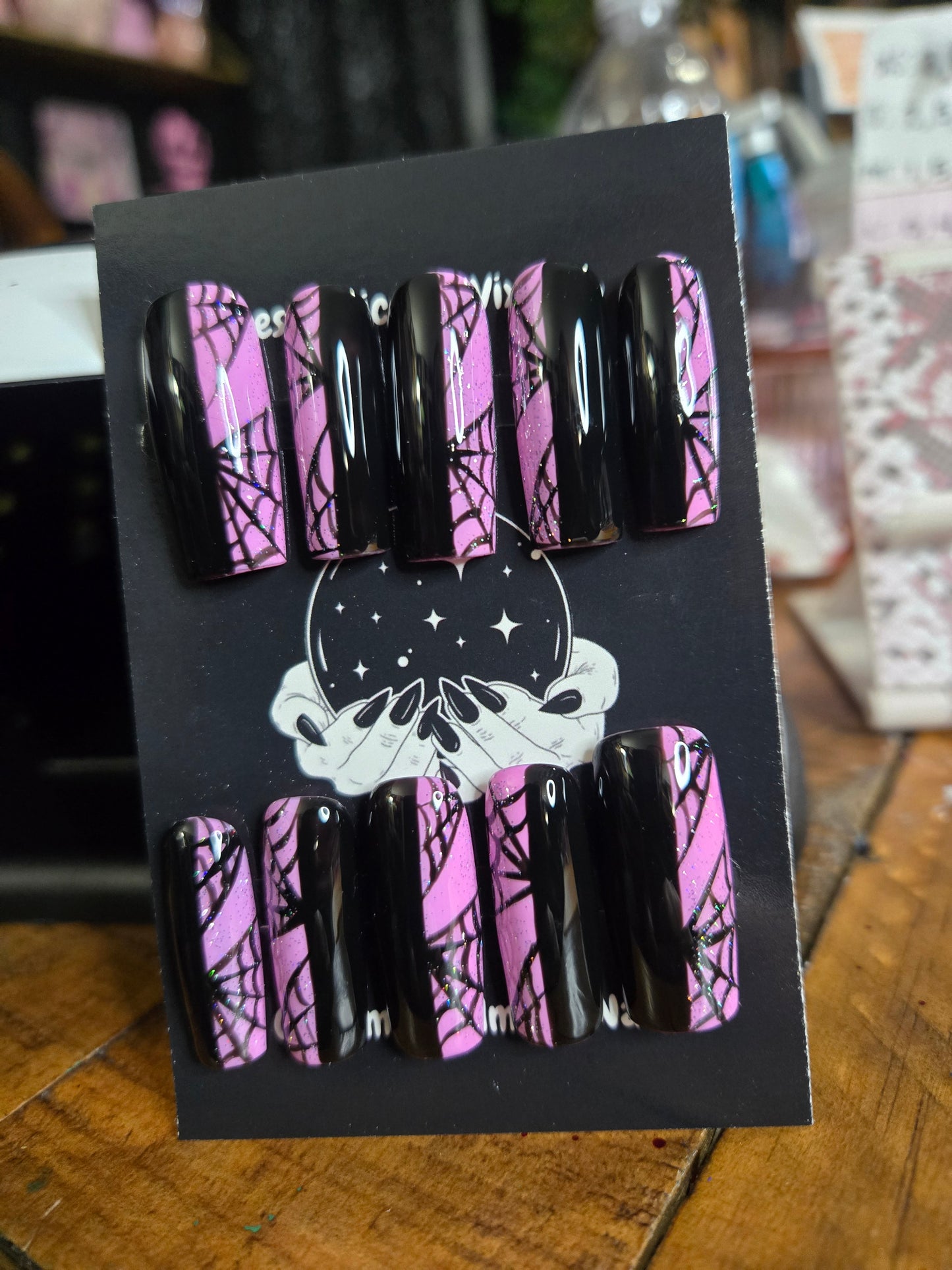 Split pink and black spiderweb nails