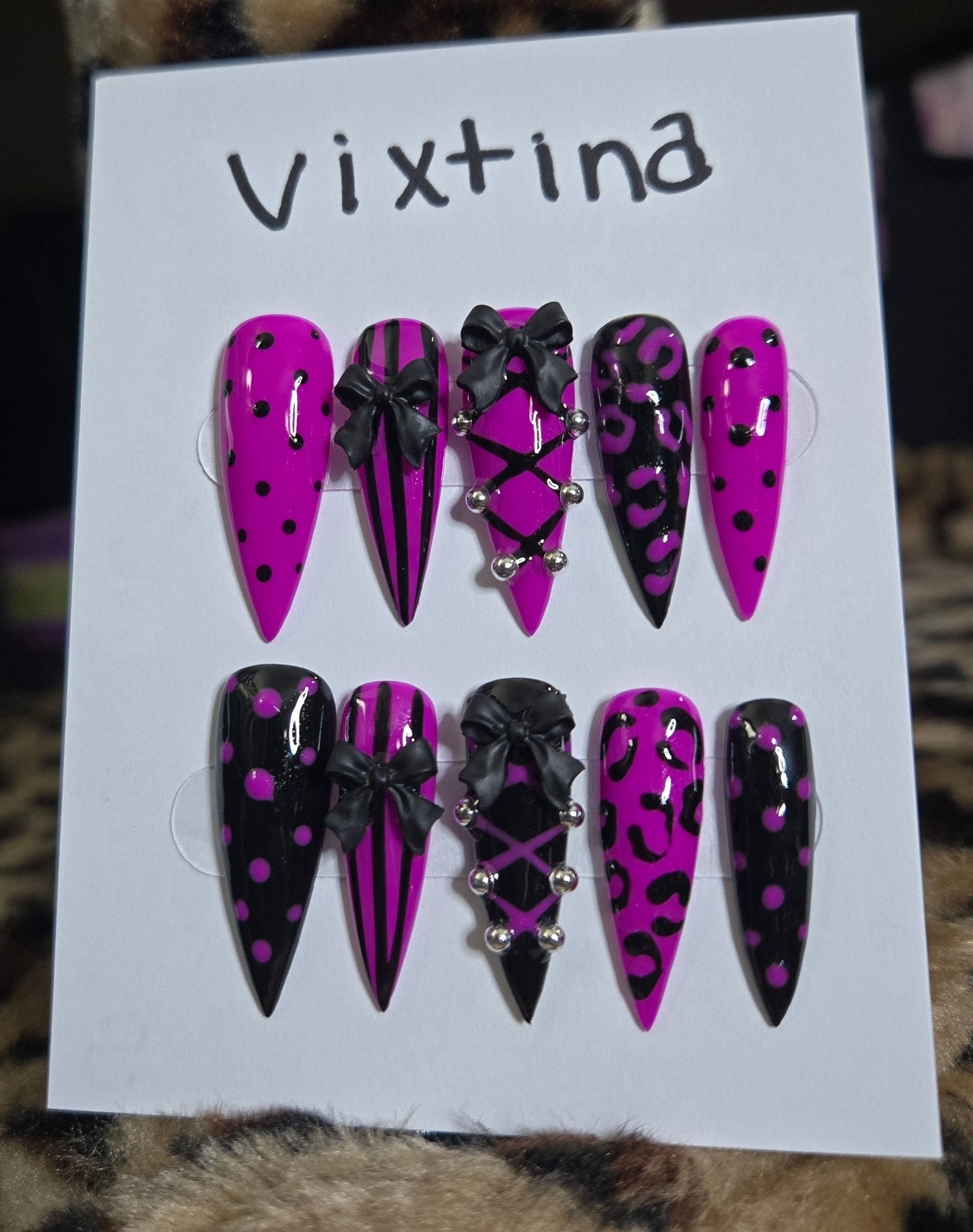 Baddie corset and bow animal print nails